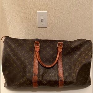 LV MONO KEEPALL 45 ( ZIP TARE )